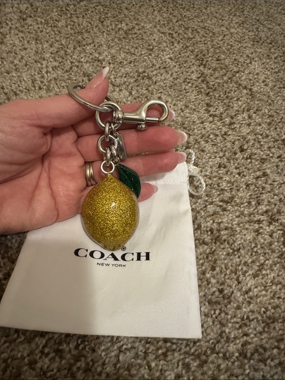 COACH GLITTER LEMON RESIN BAG CHARM